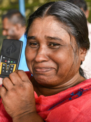 woman listening to audio Bible